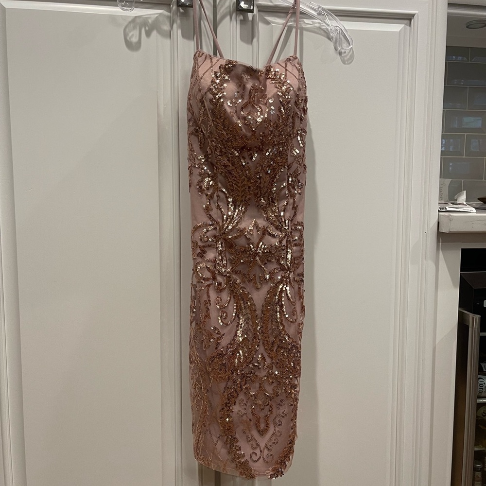 2 Homecoming dresses, rose gold, brand new, tags on, corset back. Size 2 and 4